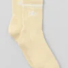 Calcetines unisex de caña media estilo retro - Amarillo candlelight/Blanco