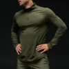 Camiseta de manga larga Conquer Reform con cremallera de 1/4 - Verde oliva
