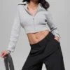 Chaqueta corta de punto «Scholar» con cremallera completa — Gris jaspeado deportivo