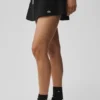 Falda de talle bajo, la favorita de las fans - Negro