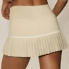 Falda de tenis «My Serve» de algodón y cachemira, High-Waist - Beige arena/Blanco