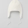 Gorro de invierno «Winter Bliss» con orejeras y punto trenzado - Marfil