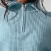 Jersey de cachemira con tejido de panal y cremallera de 1/4 — Azul celeste jaspeado
