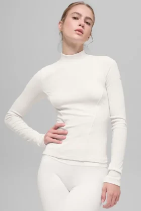 Jersey de manga larga con cuello alto y canalé «Mesmerize» - Marfil