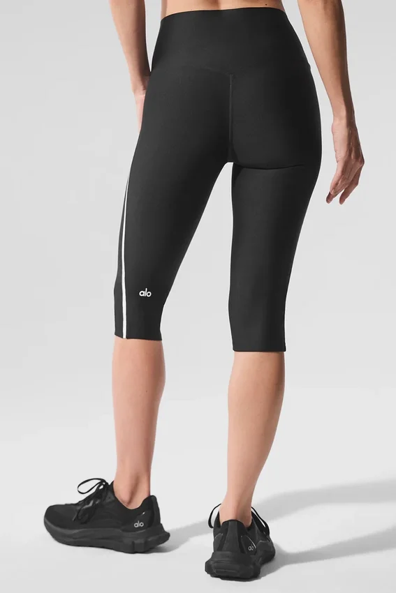 Pantalón capri High-Waist Airlift de corte superelegante con contraste - Negro/Blanco