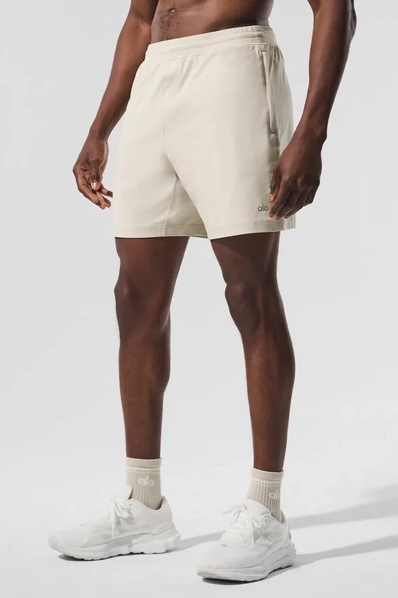 Pantalón corto Conquer React Performance de 7" - Bone