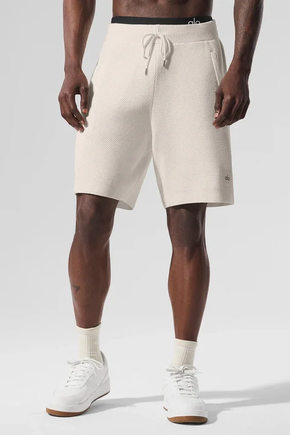 Pantalón corto de punto tipo jersé «Sports Club» de 7" – Marfil