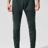 Pantalón deportivo Conquer React — Verde carbón
