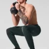 Pantalón deportivo Conquer React — Verde carbón