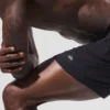 Pantalones cortos deportivos Conquer React de 7" - Negro