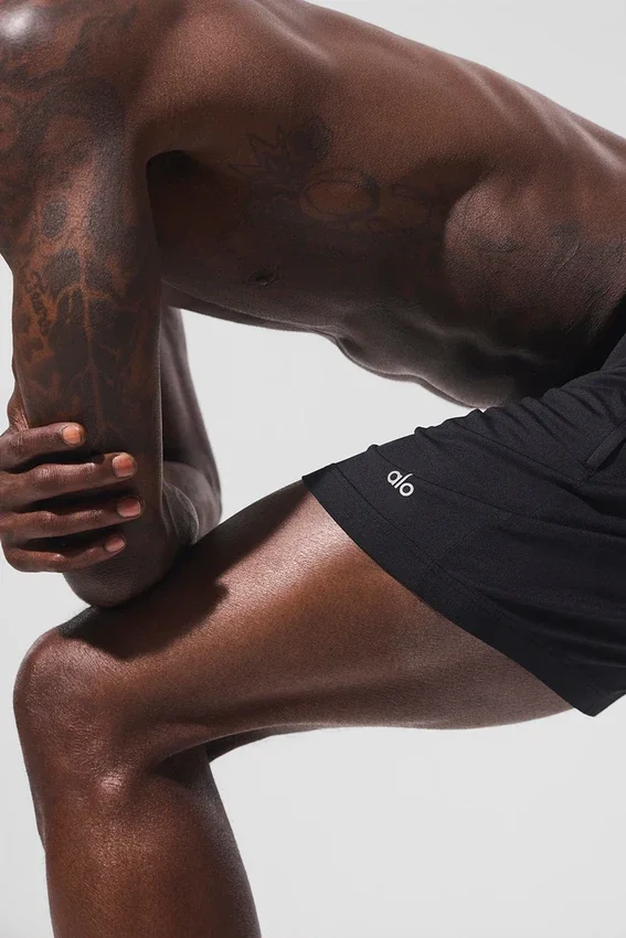 Pantalones cortos deportivos Conquer React de 7" - Negro
