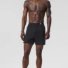 Pantalones cortos deportivos Conquer React de 7" - Negro