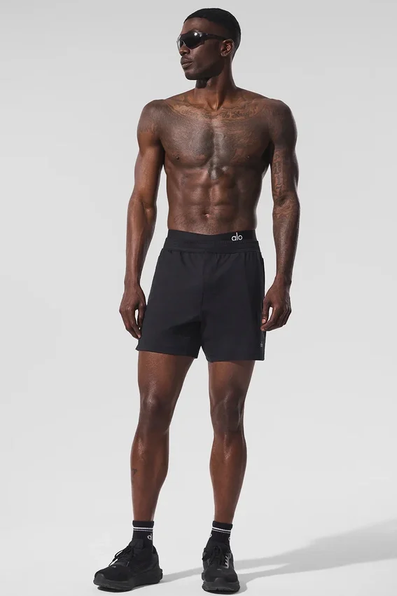 Pantalones cortos deportivos Conquer React de 7" - Negro