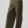 Pantalones «Cosmopolitan» de talle medio con botones a presión - Olive Tree