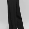 Pantalones de pierna ancha y aireados (corte regular) - Negro
