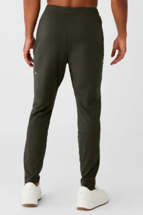 Pantalones deportivos Conquer React – Verde sigiloso