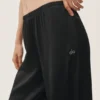 Pantalones High-Waist «Radiance» de mezcla de seda - Negro
